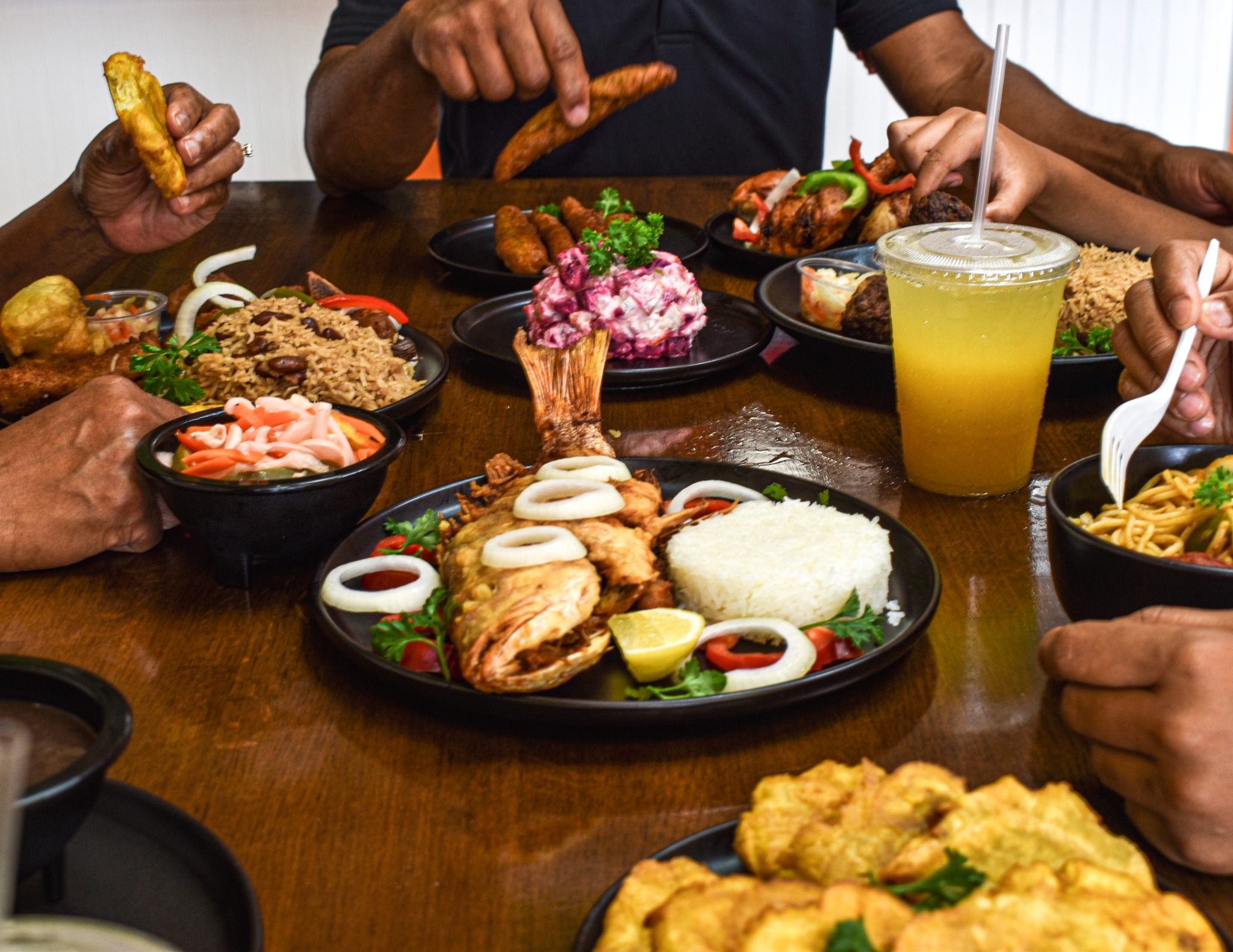 Haitian dishes shared around a family table